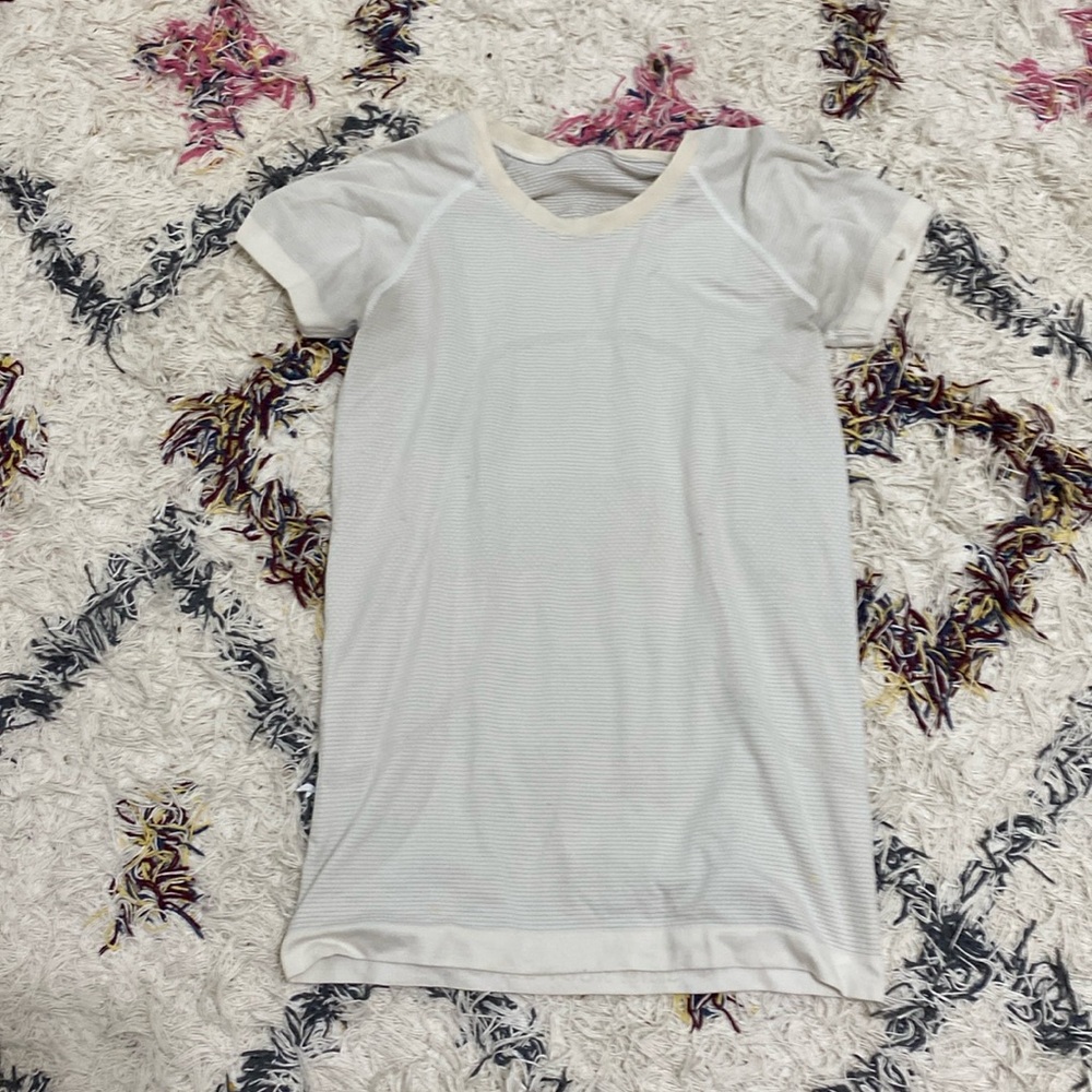 Lululemon swiftly size 6 the color is white no stains or holes